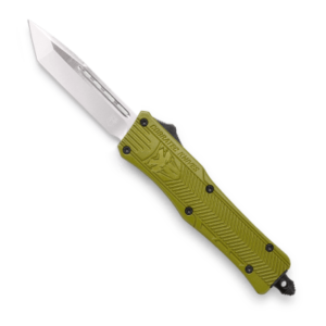 The CobraTec CTK-1 line provides plenty of options to find the perfect knife for you. Manufactured from D2 stainless steel and high-grade aluminum, this knife will get the job done task after task. Features include an ambidextrous trigger, a pocket clip, a glass breaker, and a nylon sheath. Pick out the perfect knife for you at the best price online from us today! CobraTec CTK-1 OD-Green OTF Knife – 2.75″ Plain Tanto Blade with Nylon Sheath quantity 1 ADD TO CART Category: OUT THE FRONT KNIVES DESCRIPTION REVIEWS (0) CobraTec CTK-1 Features The CTK-1 is one of the best out the front knife (OTF) for general use and a great choice as your everyday carry. The handle is designed from high-grade aluminum alloy and features a D2 steel blade. The knife is ambidextrous as the pocket clip can be switched to either side of the handle, depending on your preference. This OTF knife features a pocket clip, a glass breaker for emergencies and includes a nylon sheath.